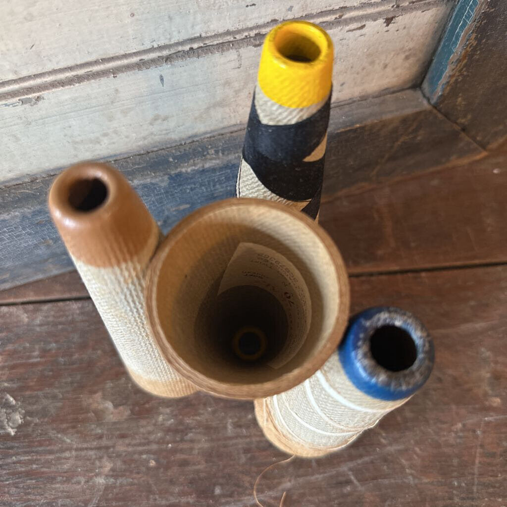 CONICAL THREAD SPOOLS