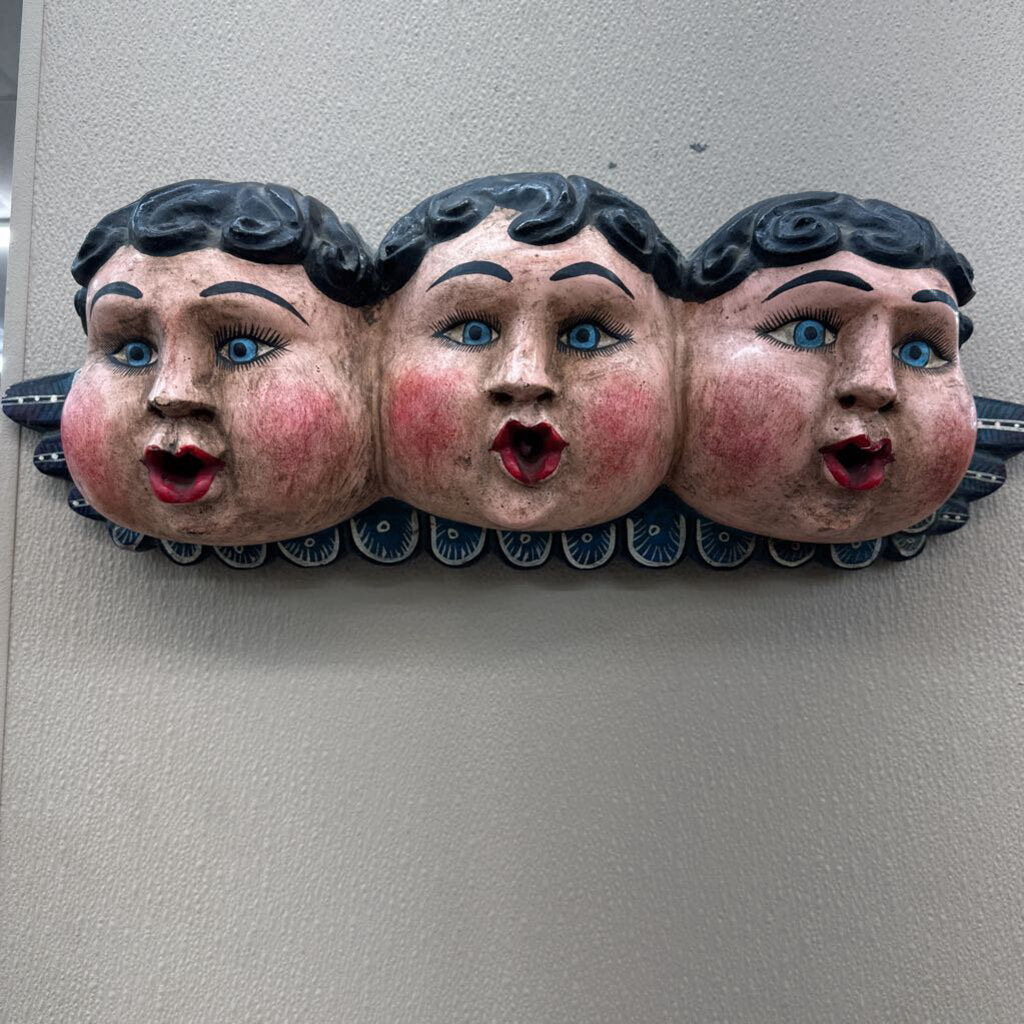 PAINTED PAPER MACHE MOLD OF THREE CHERUB FACES
