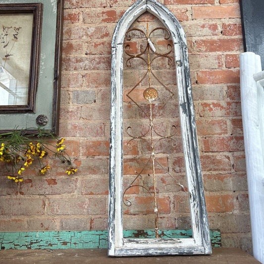 WOOD AND IRON ARCH WINDOW