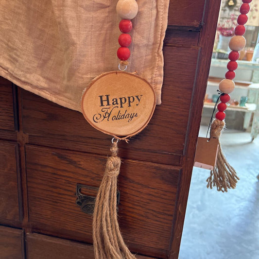 WOOD BEAD GARLAND WITH TASSEL