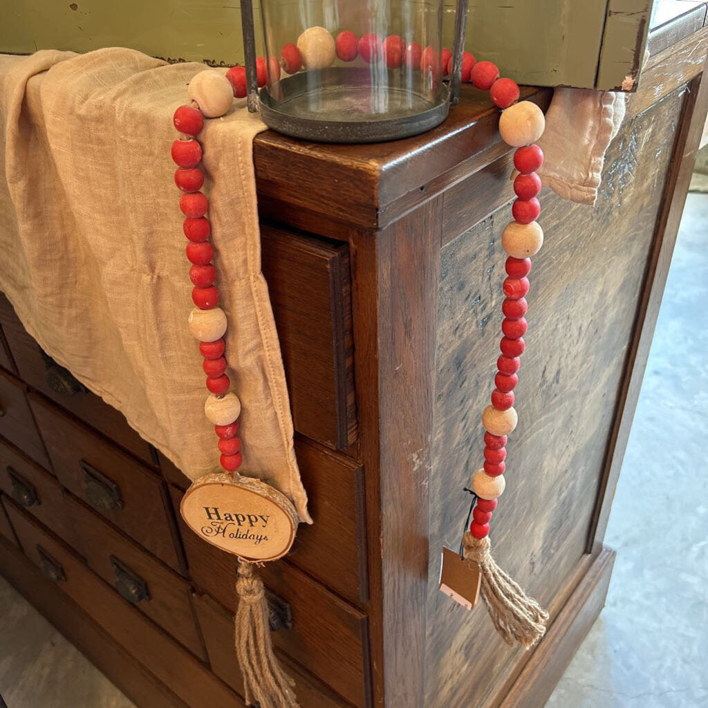 WOOD BEAD GARLAND WITH TASSEL