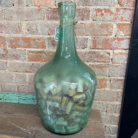 JUG FILLED WITH CORKS