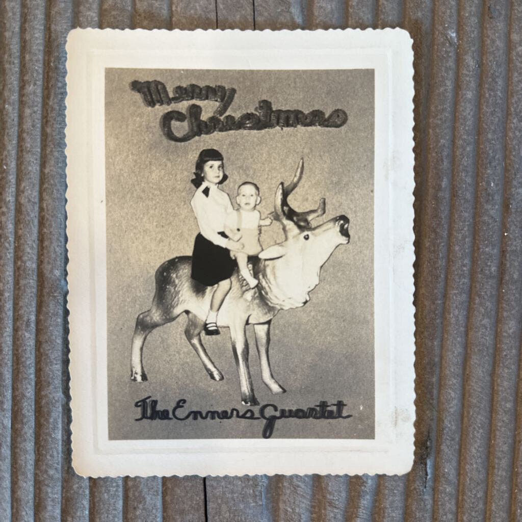 CHRISTMAS CARD WITH BOY AND GIRL ON REINDEER