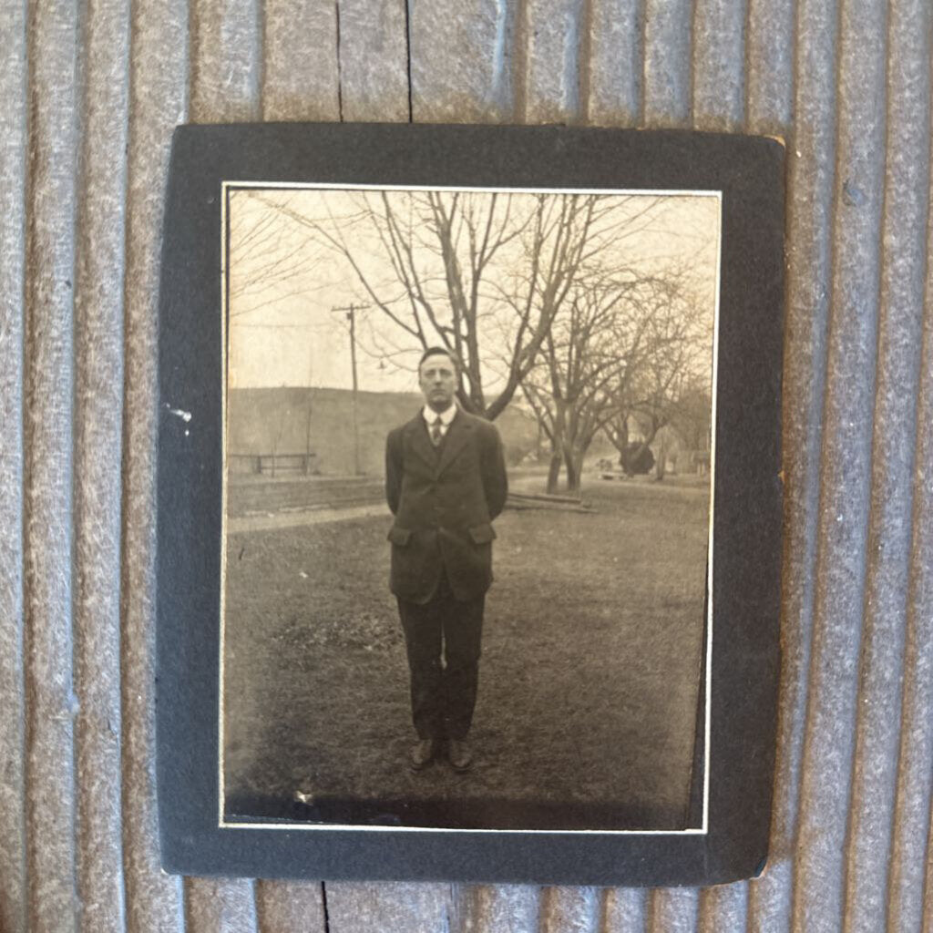 PORTRAIT CARD OF MAN IN SUIT