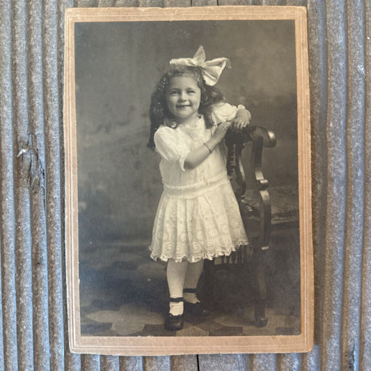 PHOTO CARD OF YOUNG GIRL