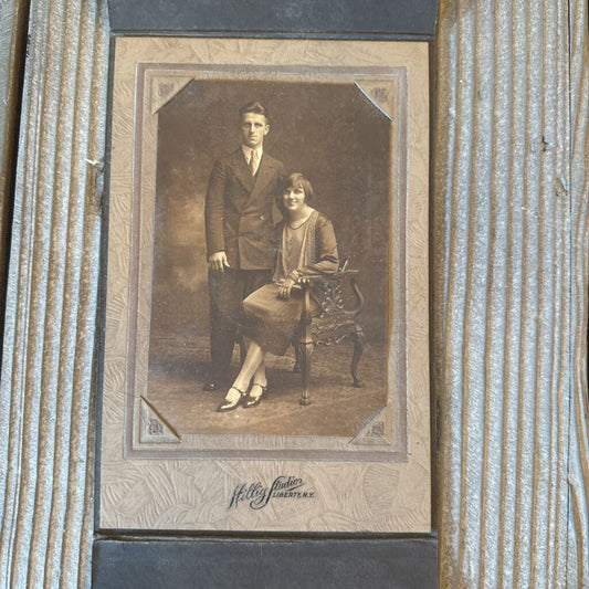 PHOTO OF COUPLE IN HOLDER