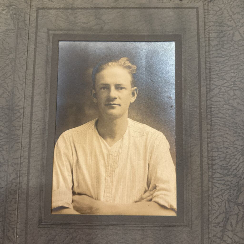 PHOTO OF YOUNG MAN IN WHITE