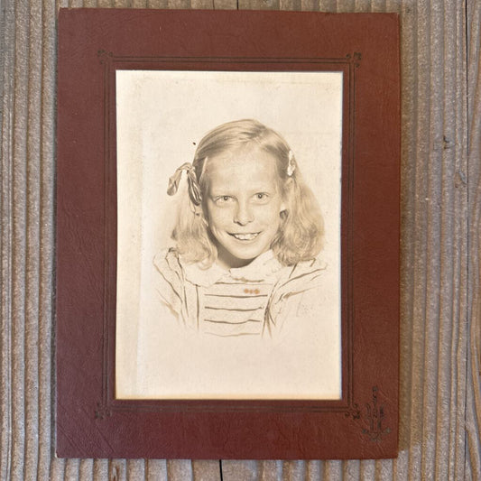 SCHOOL PHOTO OF GIRL WITH TWO BOWS