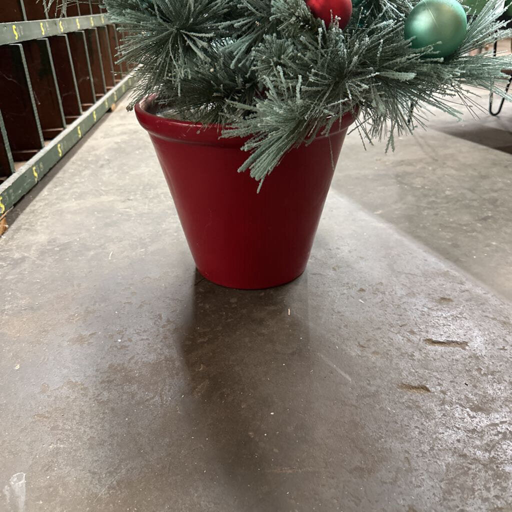 FLOCKED TREE WITH TURQUOISE AND RED ORNAMENTS