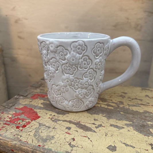 CERAMIC MUG WITH CARVED FLOWERS