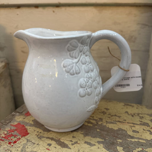 CERAMIC PITCHER WITH RAISED FLOWERS