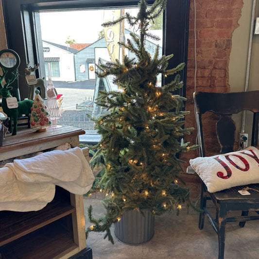 CHRISTMAS TREE IN BUCKET