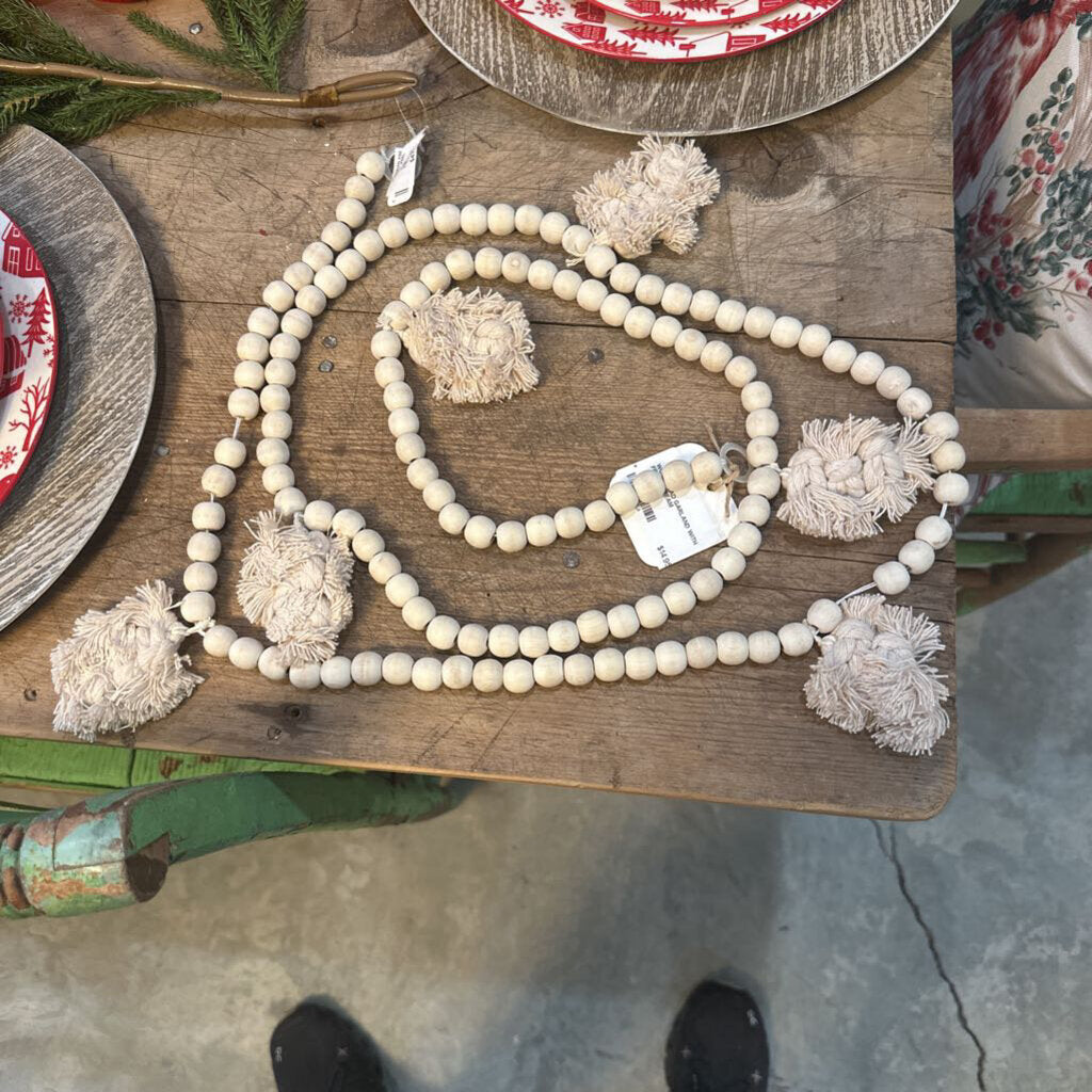 WOOD BEAD GARLAND WITH FRINGE