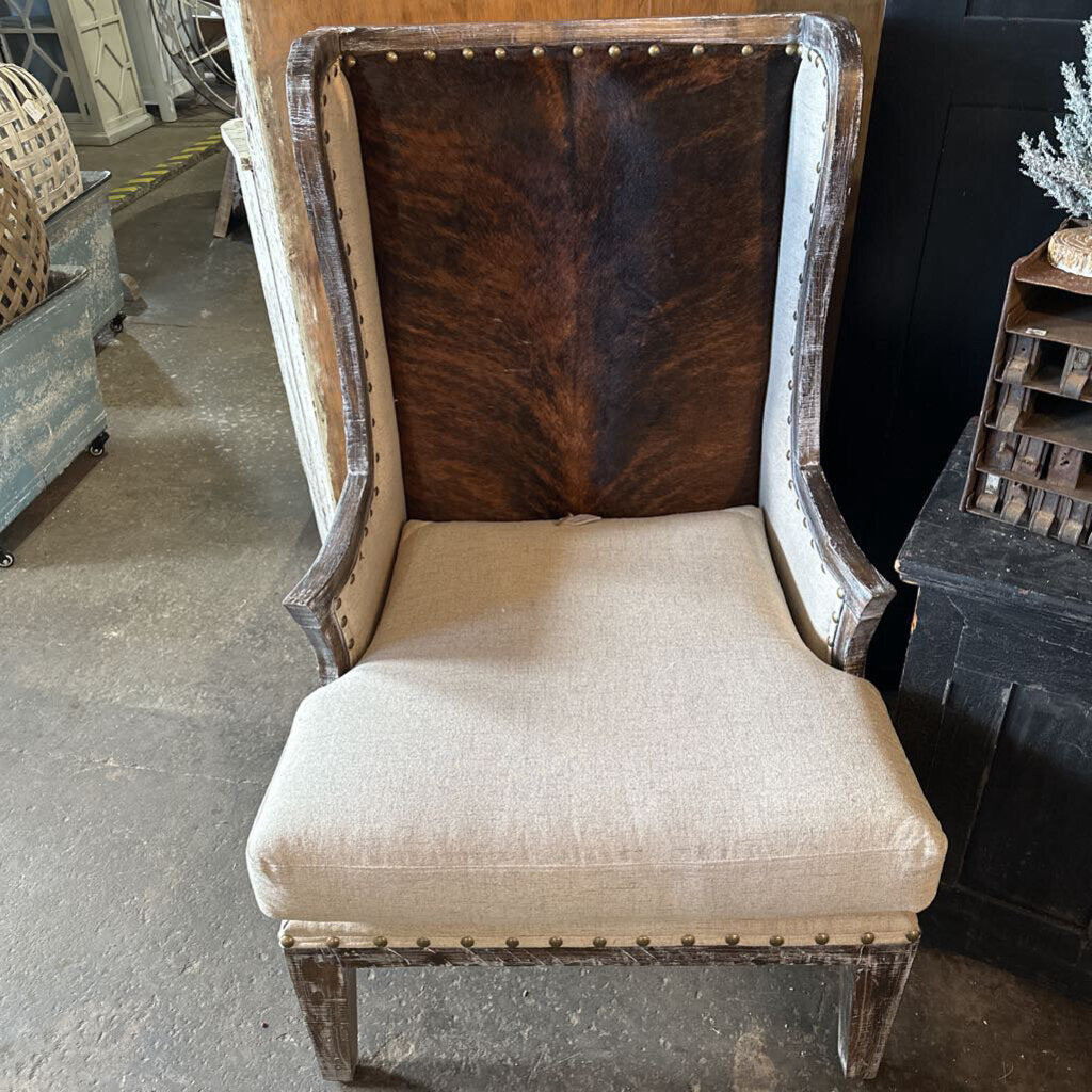 COWHIDE WINGBACK CHAIR