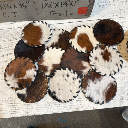COWHIDE COASTERS WITH STITCHED EDGING