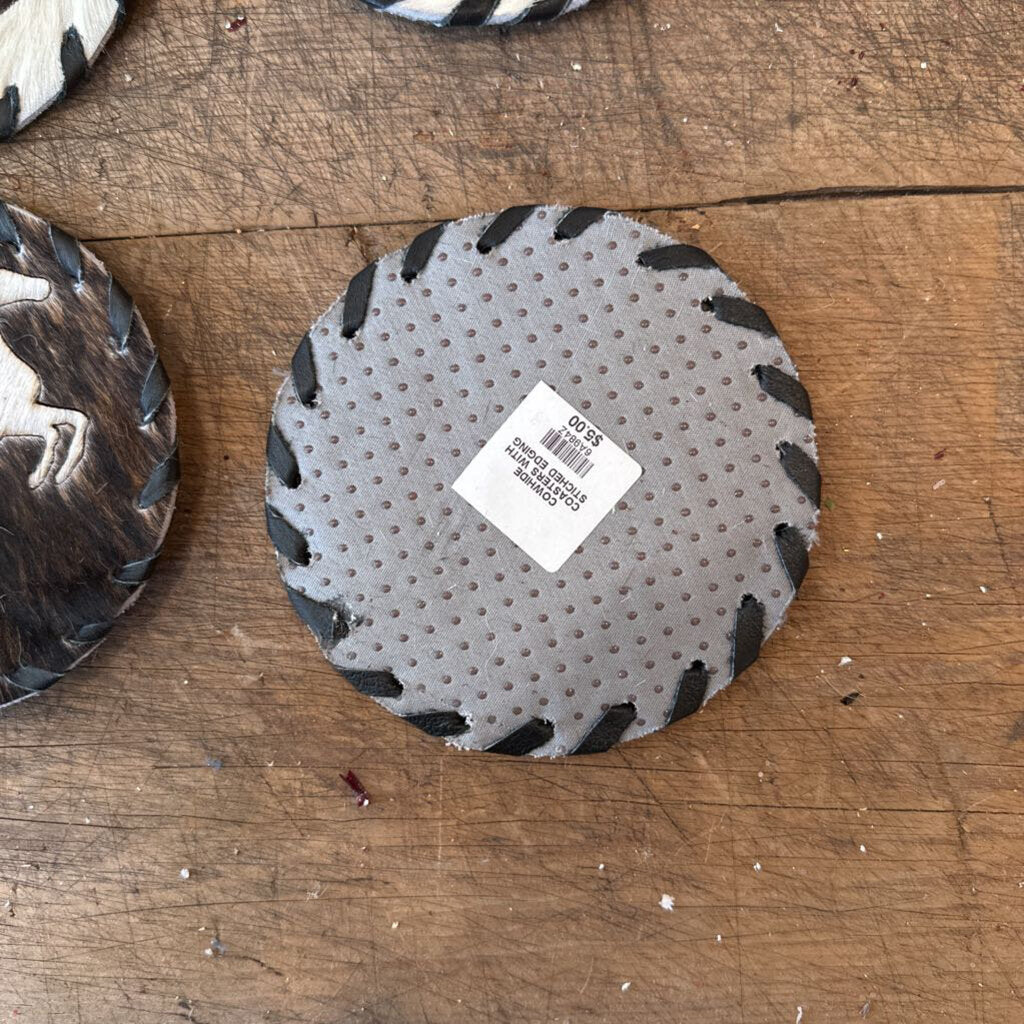 COWHIDE COASTERS WITH STITCHED EDGING