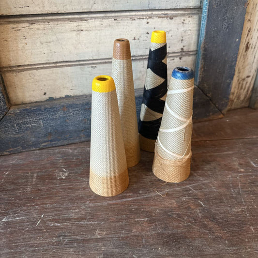 CONICAL THREAD SPOOLS