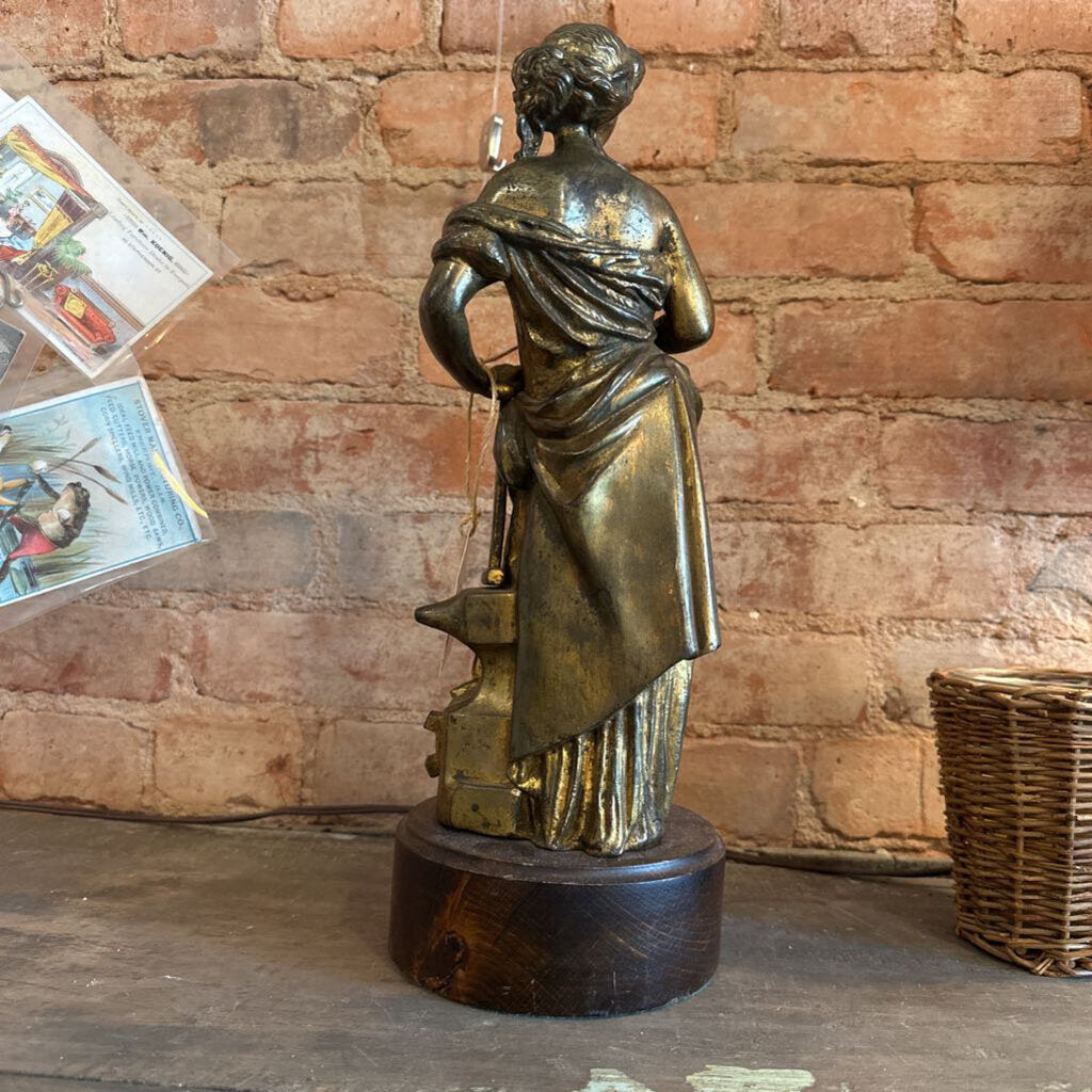 BRONZE STATUE OF A WOMAN