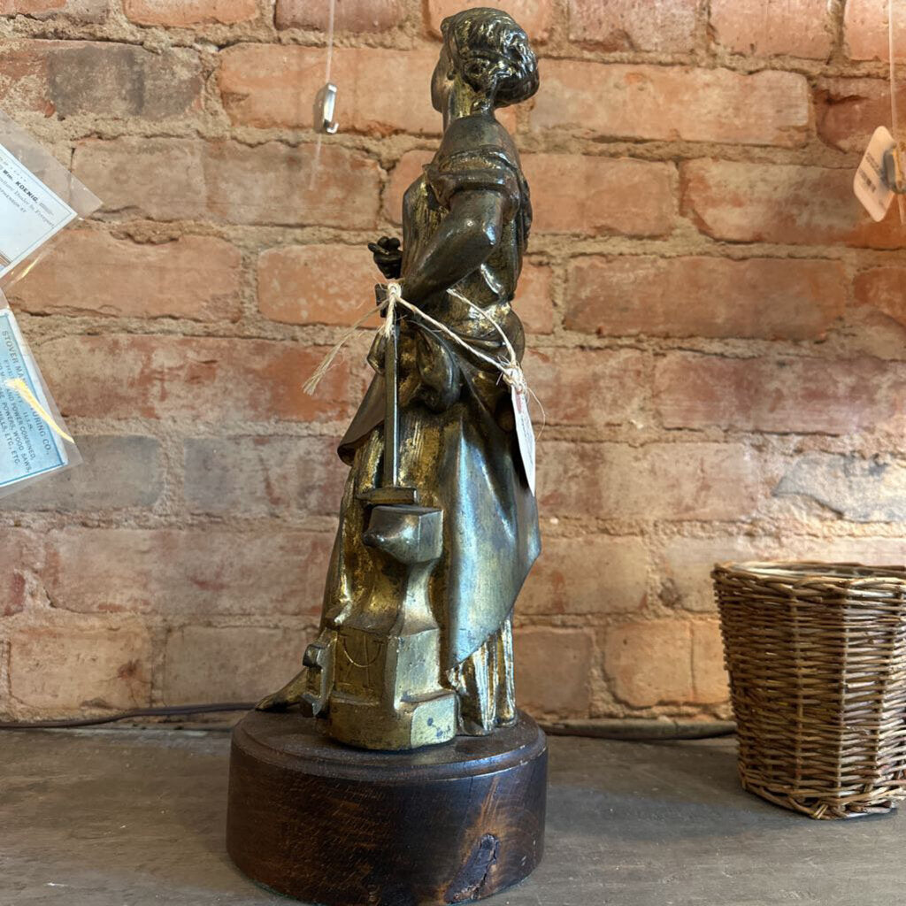 BRONZE STATUE OF A WOMAN