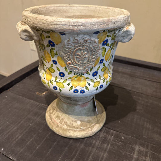 CONCRETE URN WITH LEMONS