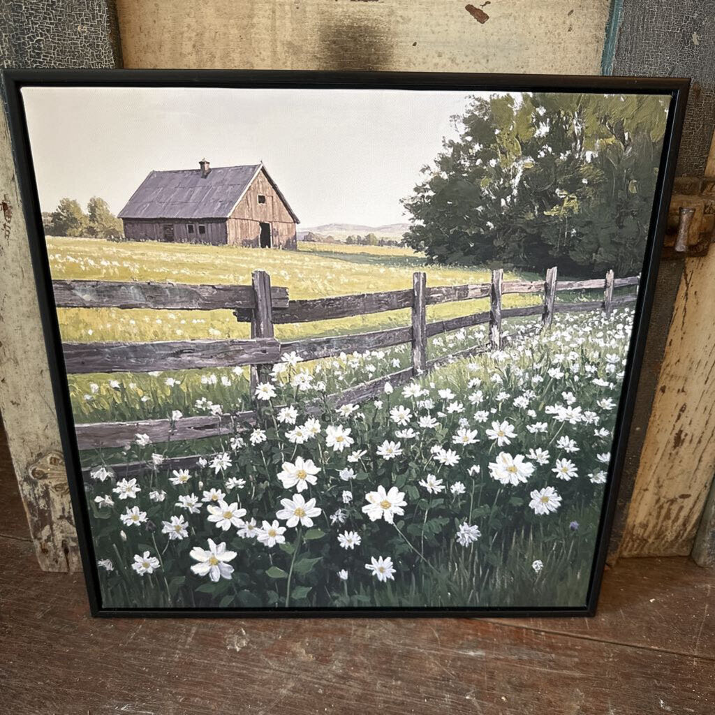 FRAMED PRINT OF BARN IN FIELD OF WILDFLOWERS