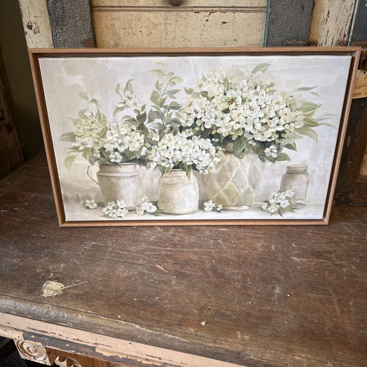 FRAMED CANVAS OF WHITE FLOWERS IN CONTAINERS
