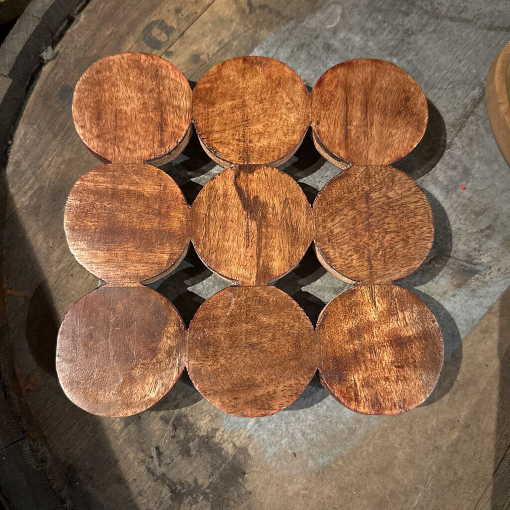 WOODEN TRIVET WITH CIRCLE SHAPES