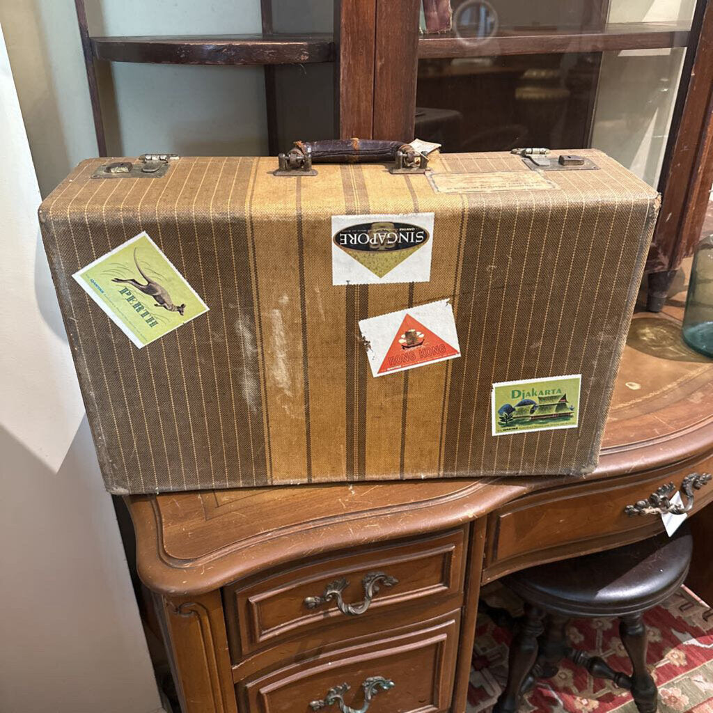 SUITCASE WITH OLD TRAVEL STICKERS