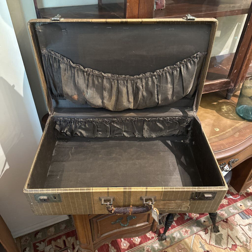 SUITCASE WITH OLD TRAVEL STICKERS