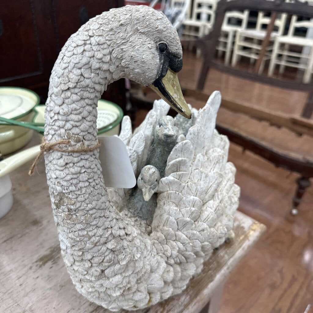 SWAN WITH CYGNETS ON IT'S BACK